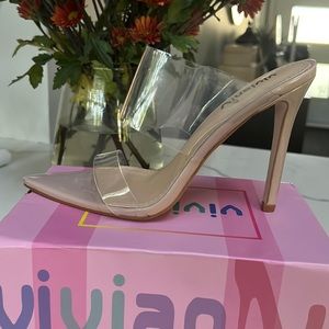 Brand new clear and nude heel